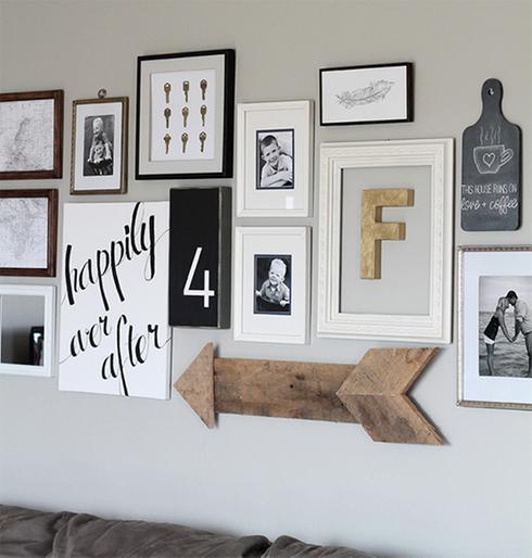 Decorate a wall with framed pictures.