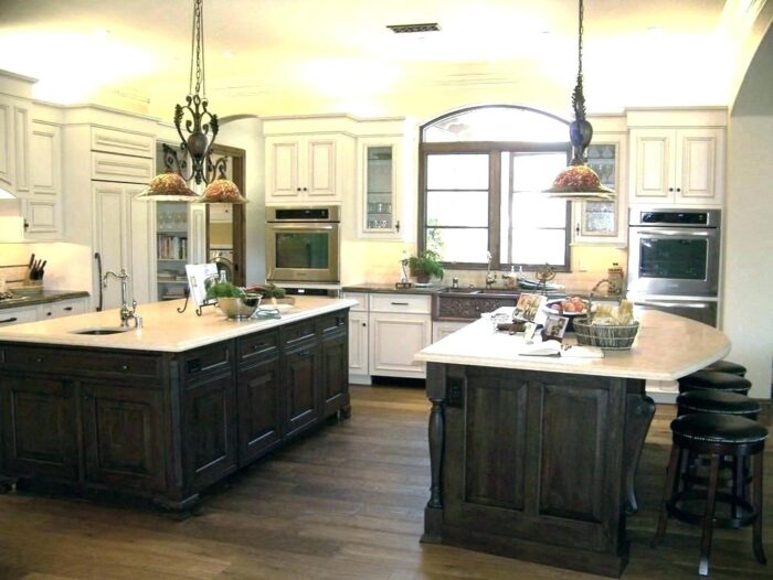 A large kitchen with a center island and stools, perfect for kitchen ideas.