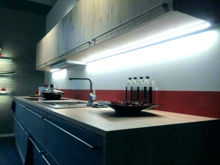 Kitchen lit up with LED lights.