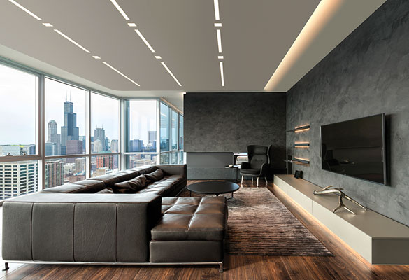 A living room with recessed lighting.