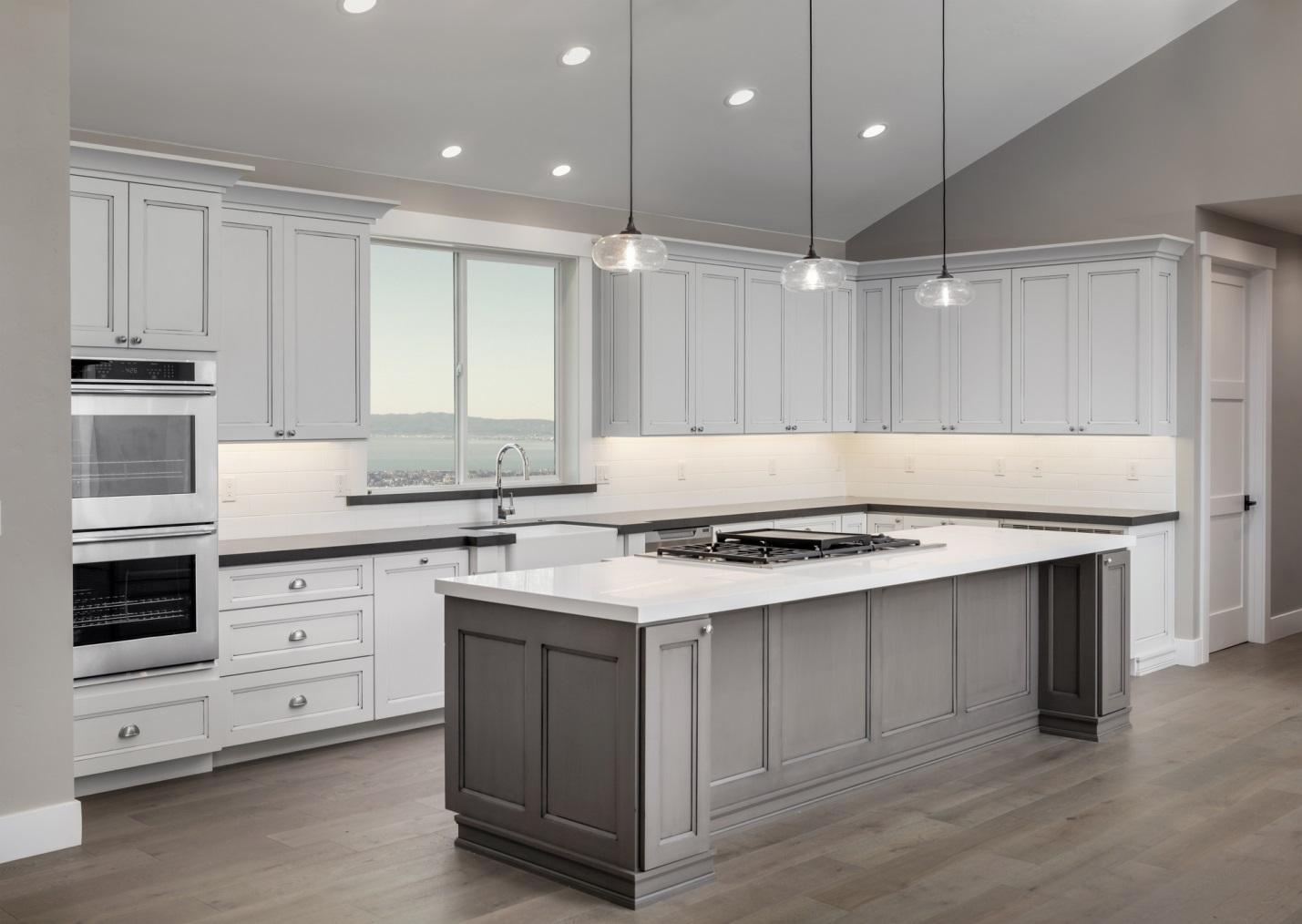 A kitchen with white cabinets and a center island, perfect for kitchen ideas.