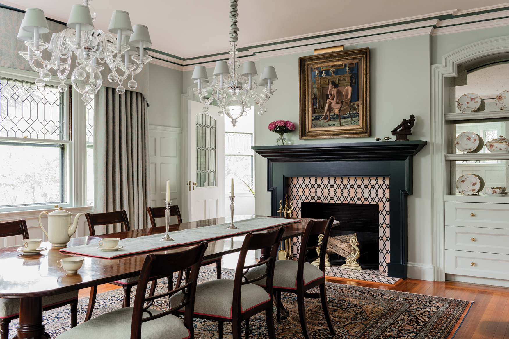 A personality-filled dining room with a fireplace.