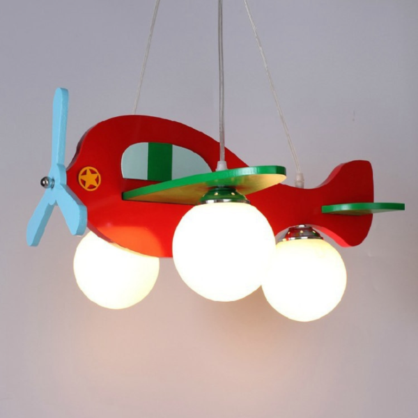 A kids' bedroom light fixture with a red airplane hanging from it.