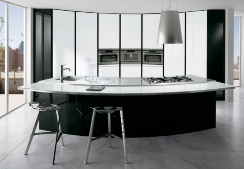 A monochrome kitchen with a center island.
