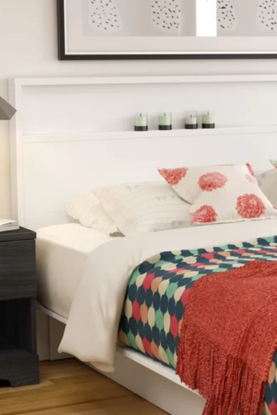 This panel headboard from Wayfair will give you more storage space