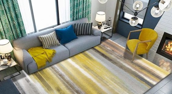 A living room with a yellow and gray rug for carpets in a living room.