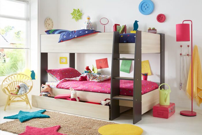 A child's bedroom with a bunk bed.