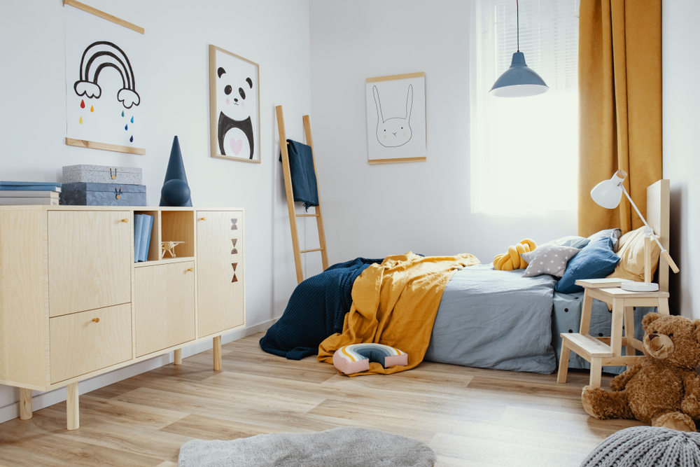 Child's Bedroom with Bed and Teddy Bear.