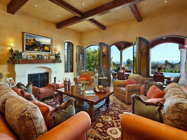 A Tuscan living room with orange furniture.