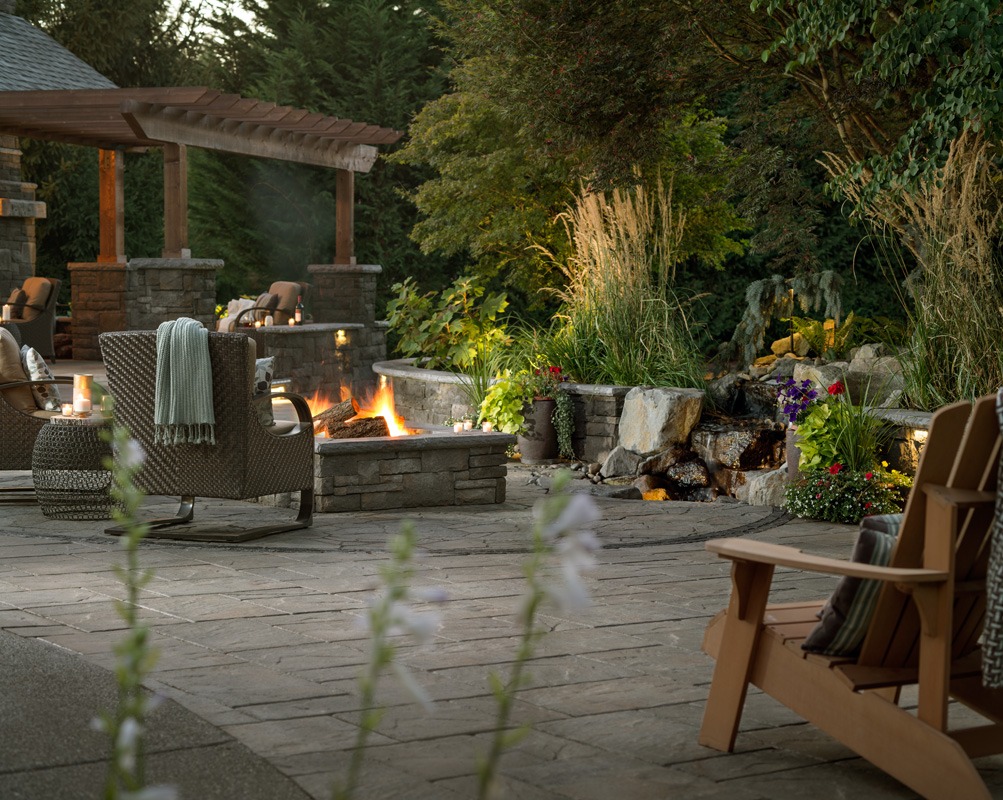 A blissful backyard with a fire pit.