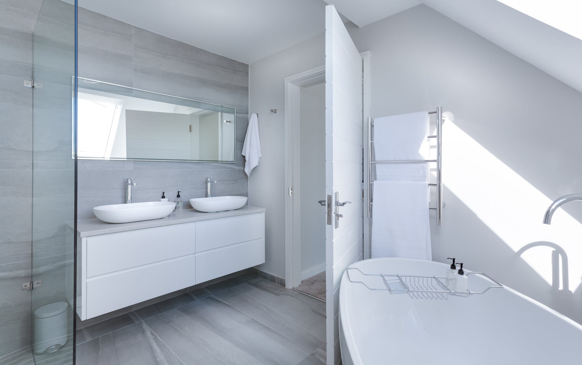 A modern bathroom with improved white fixtures.