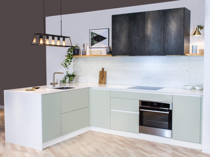 Modern kitchen peninsula design in a light interior.