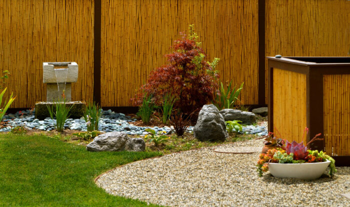 A wooden fence for a zen garden.