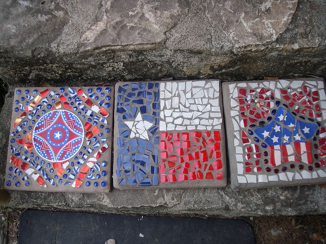 Three mosaic garden stepping stones with american flags.