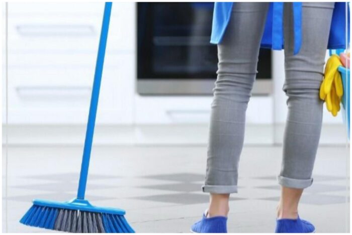 A woman cleaning supplies.