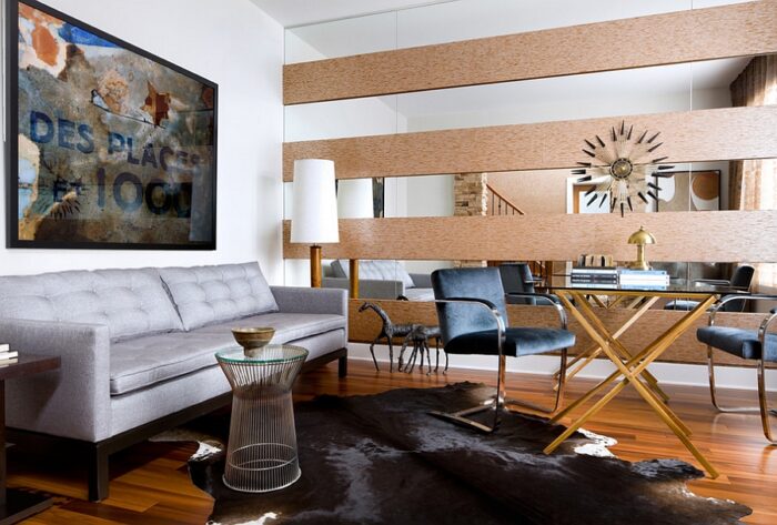 A masculine living room with a cowhide rug.