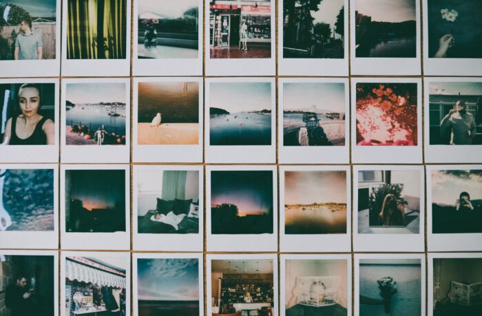 A collection of polaroid photos on a wall showcasing various photo ideas.
