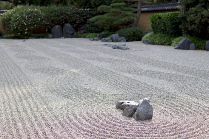 A serene Zen garden with an abundance of rocks.