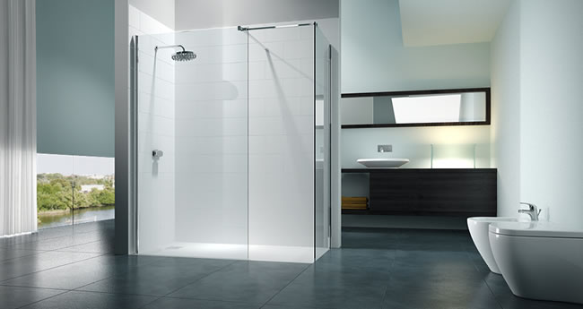 A modern glass shower stall.