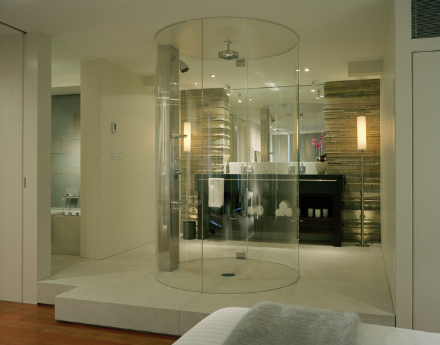 A contemporary bathroom showcasing a glass shower stall.