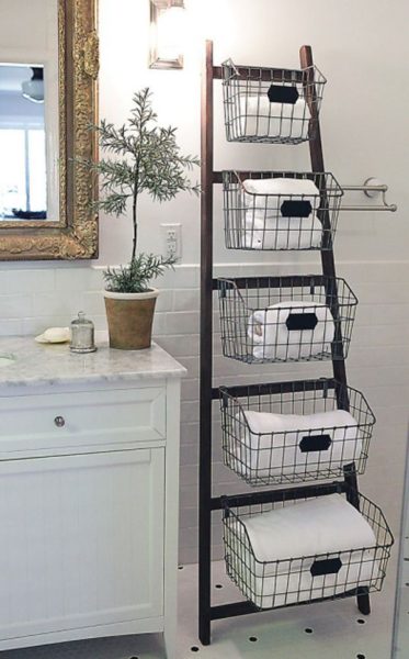 A bathroom ladder providing towel storage.