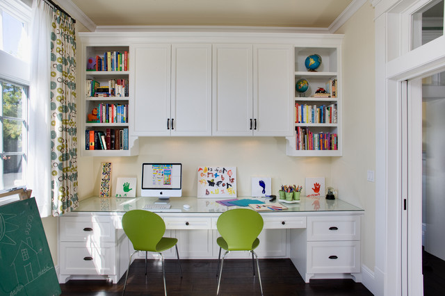 Study room design ideas: A white home office with green chairs and bookshelves for inspiration.