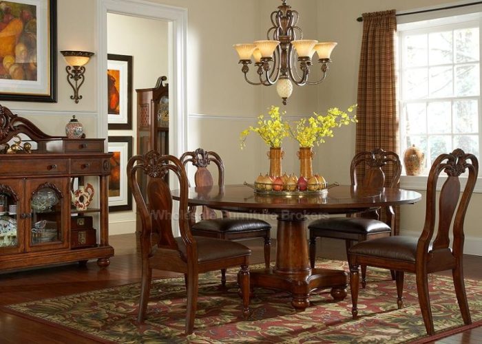A Victorian dining room with a round table.