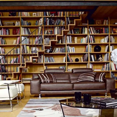 A home library featuring bookshelves in the living room.