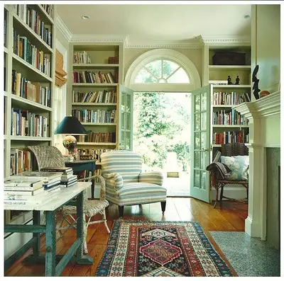 Home library with bookshelves.
