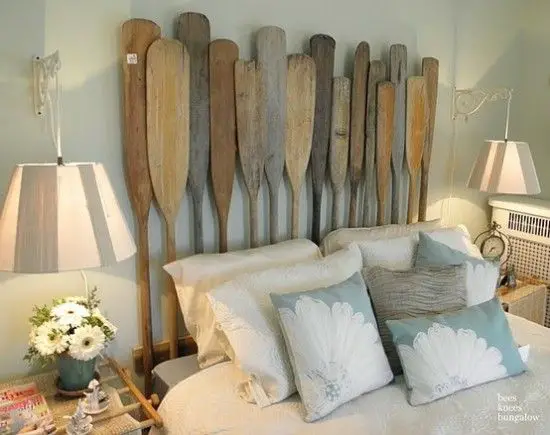 A unique headboard made out of oars for design inspiration.