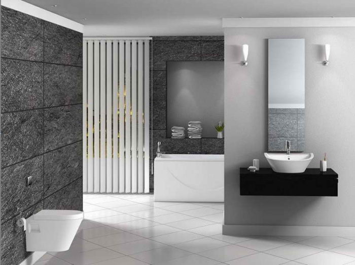 A modern bathroom with black and white tiled wall showcasing creative bathroom tile ideas.