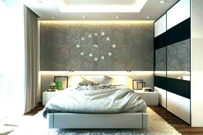 A small master bedroom with a clock on the wall.