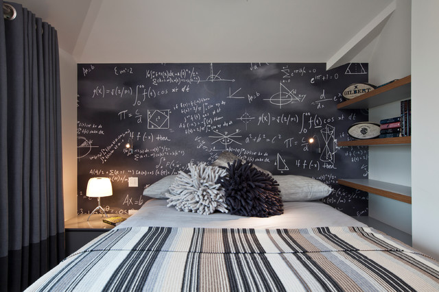 A bedroom with a creative wall decoration.
