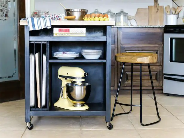A small kitchen island with stools.