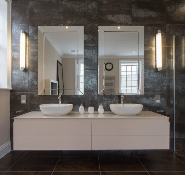 A modern bathroom with two sinks and mirror ideas.