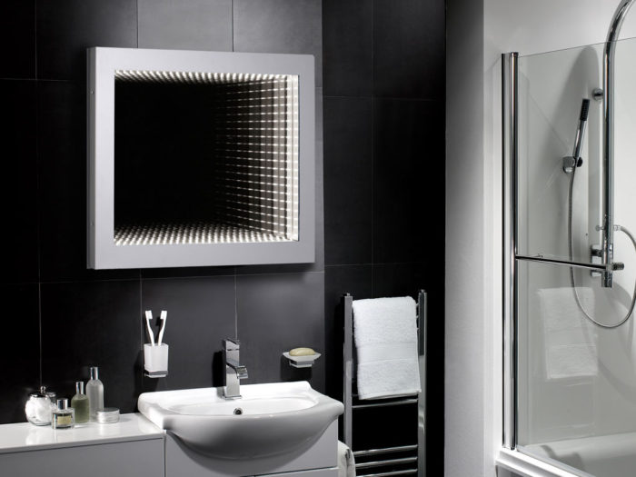 A bathroom with stylish mirror ideas.