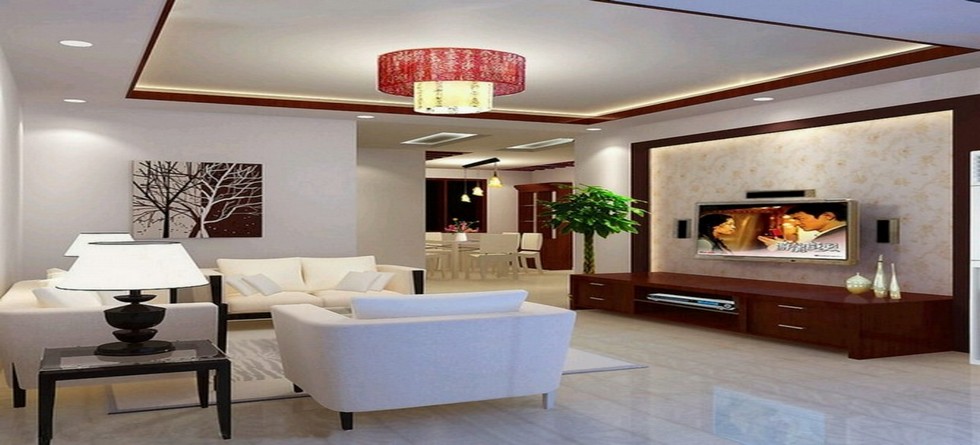 A living room with white furniture and indoor lighting.