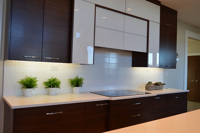 A modern kitchen with brown cabinets.