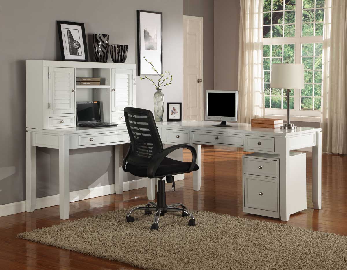 A white home office with a desk and chair.