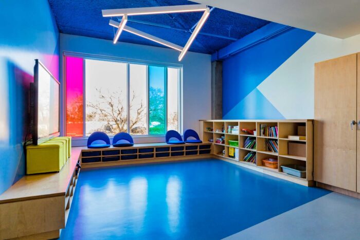 A children's room with colorful walls and Artigo Rubber Flooring for Schools.