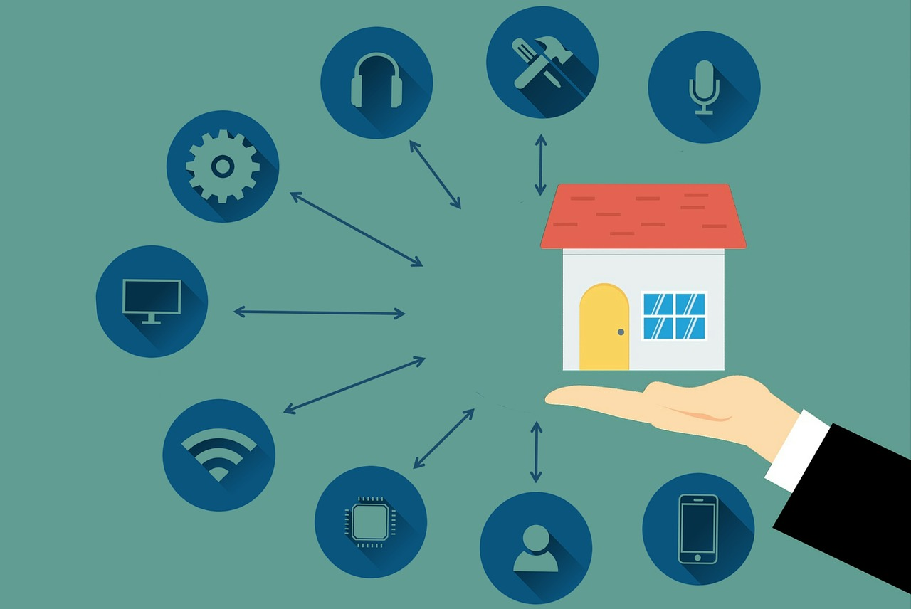 A hand holding a house with smart home icons around it, helping you choose the right home security system.