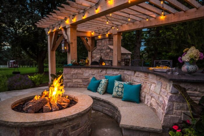 Best outdoor patio with a fire pit and outdoor lighting.