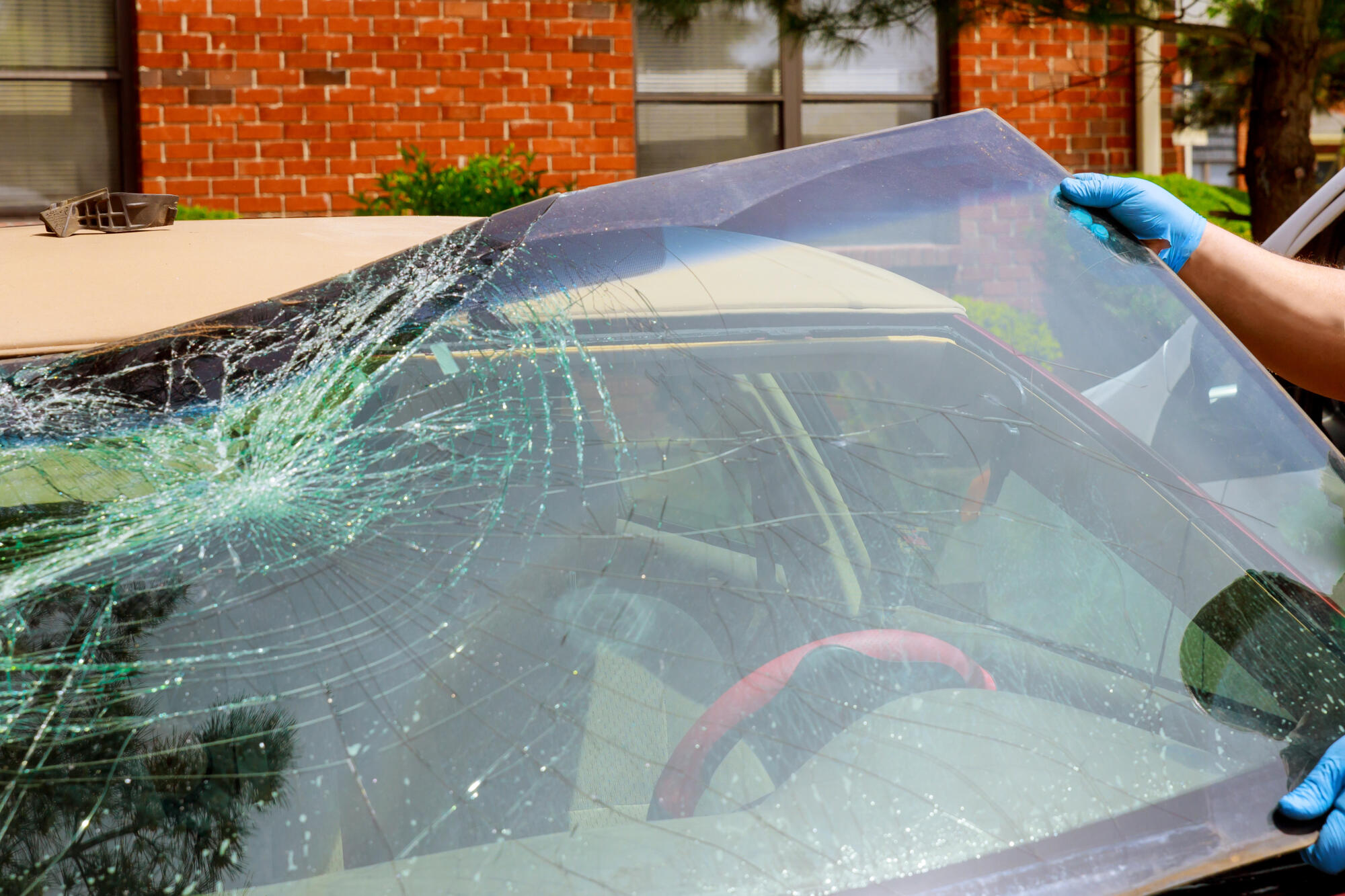 A damaged car windshield.