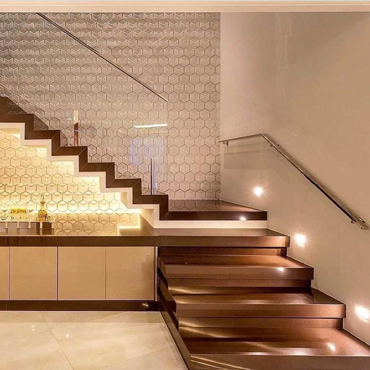 A modern staircase with a glass railing for safer stairways.