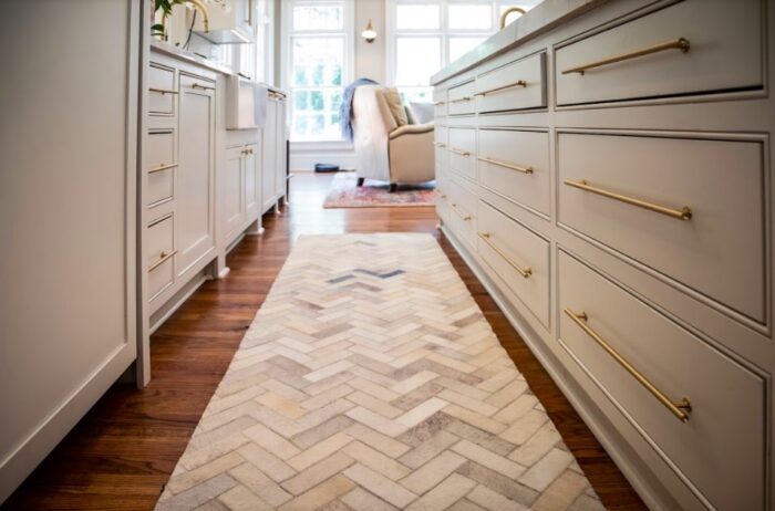 Upgrades: A kitchen with a herringbone runner rug revolutionizes your space.