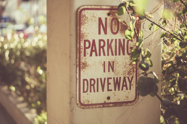 No parking sign for paved driveways.