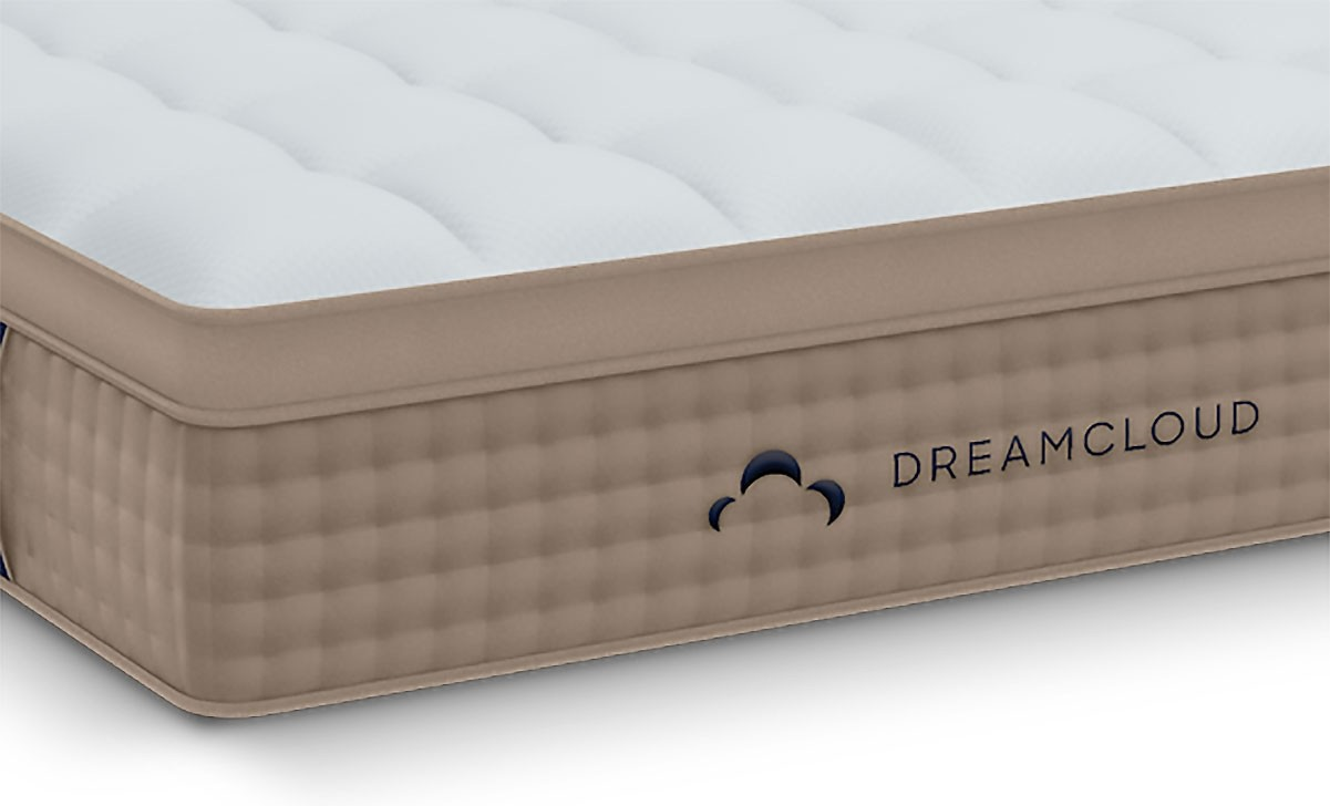 The dreamcloud mattress is shown on a white background in this Mattress Buying Guide.
