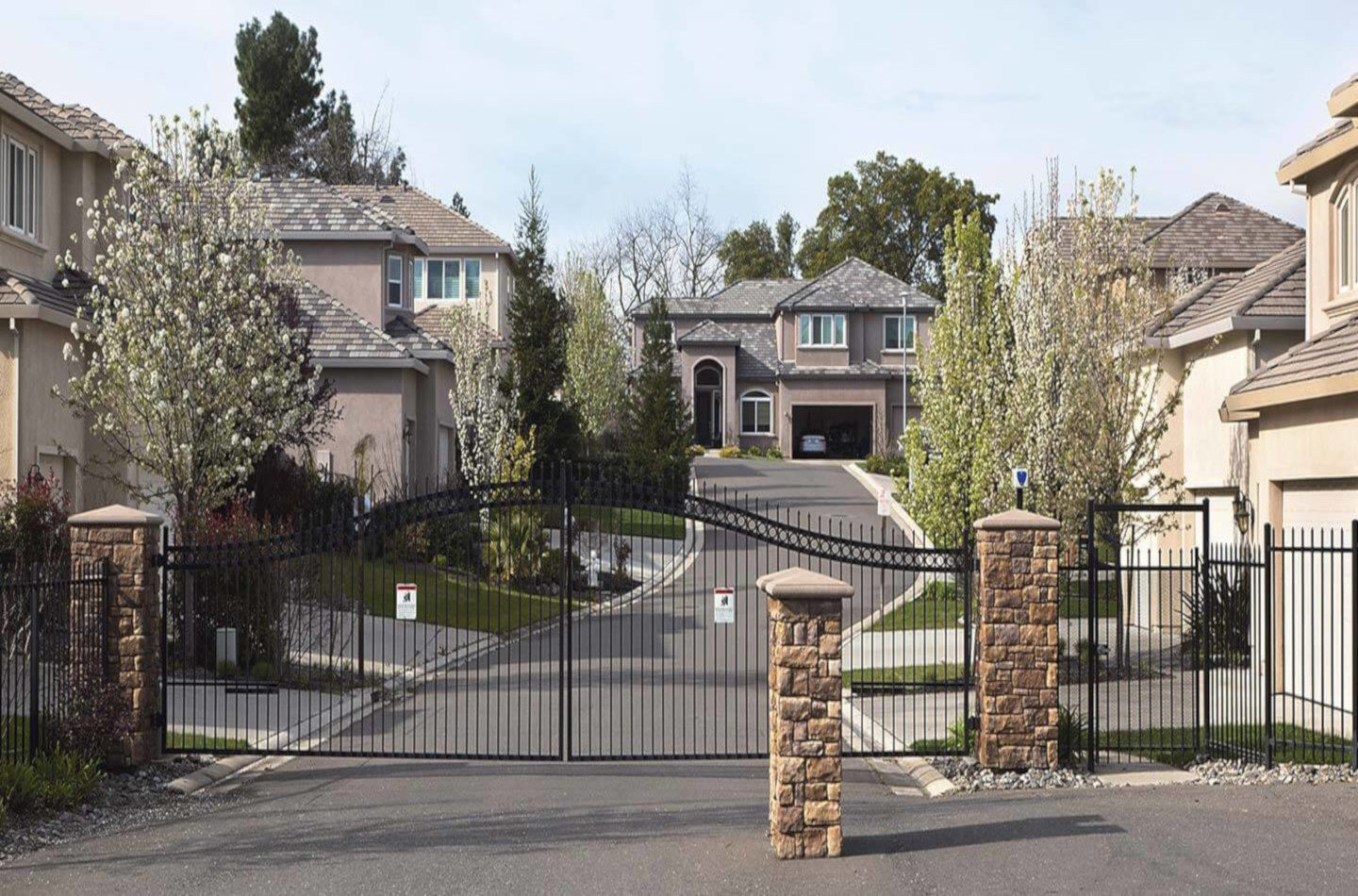 A residential neighborhood with a gated entrance.