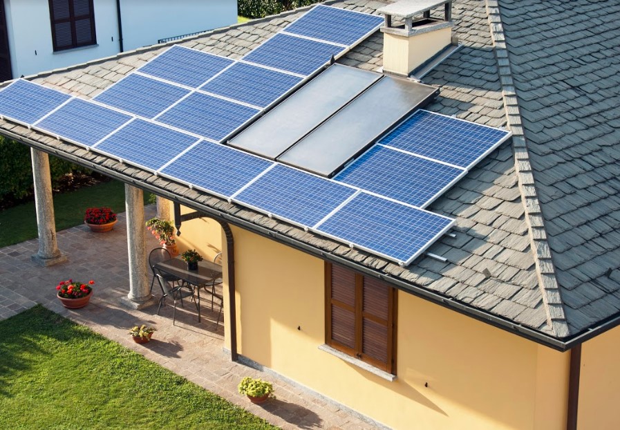 Solar panels on the roof of a house with solar battery.