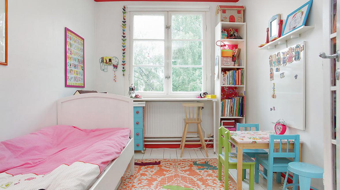 Tips for Decorating Your Child's Room in an Apartment with a bed, desk and bookshelf.